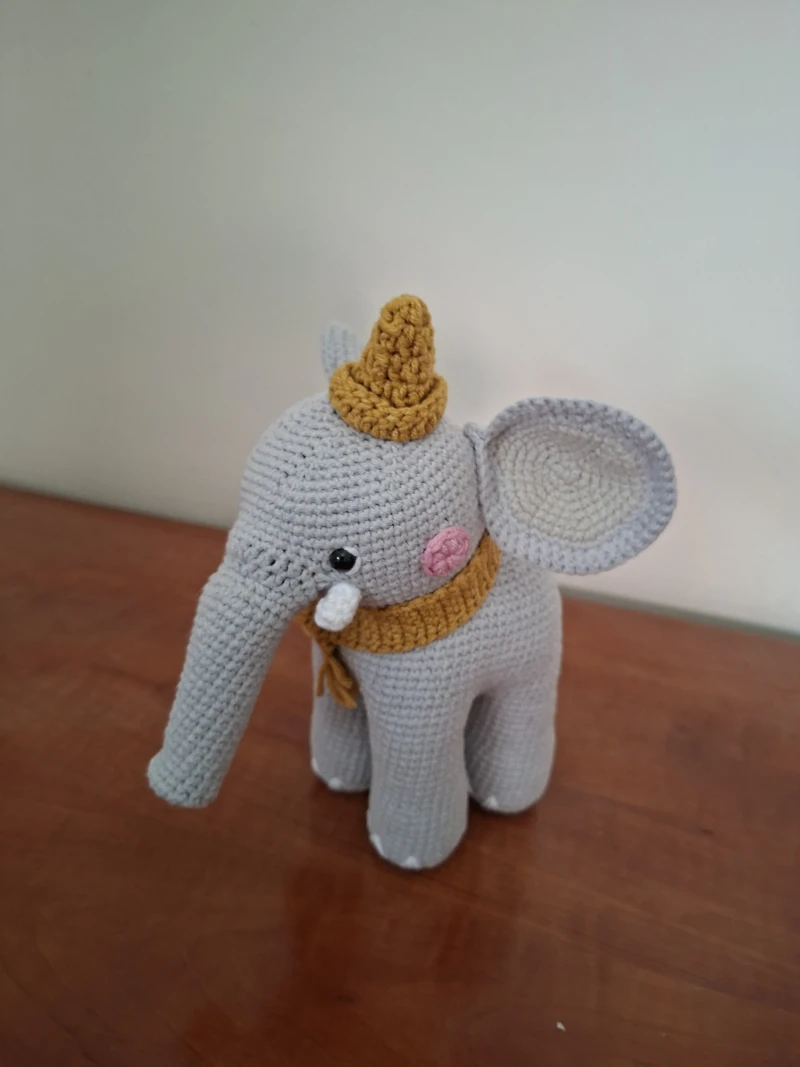 A crocheted amigurumi elephant