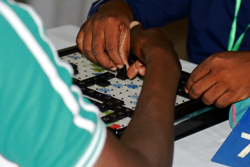 Scrabble tiles on a board